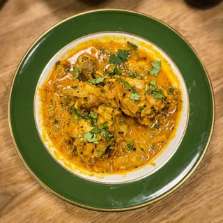 Mint and Cilantro Chicken Drumstick Curry with Rice and Classic Naan