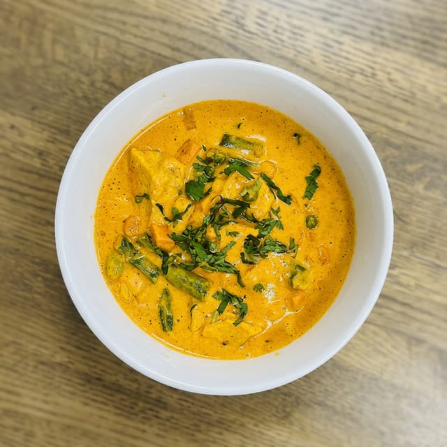 Korma Stache Served with Rice and Classic Naan.