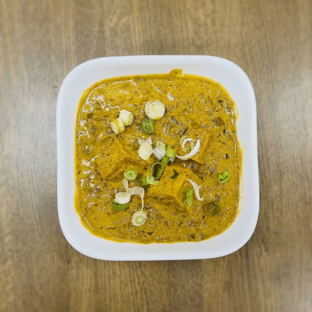 Tofu Curry Served with Rice and Garlic naan.